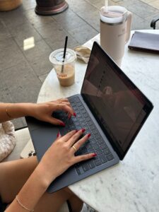 hands on laptop typing