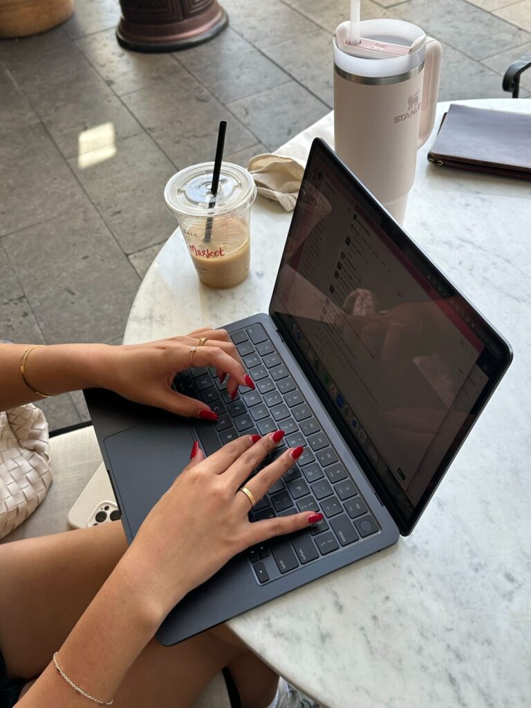 hands on laptop typing